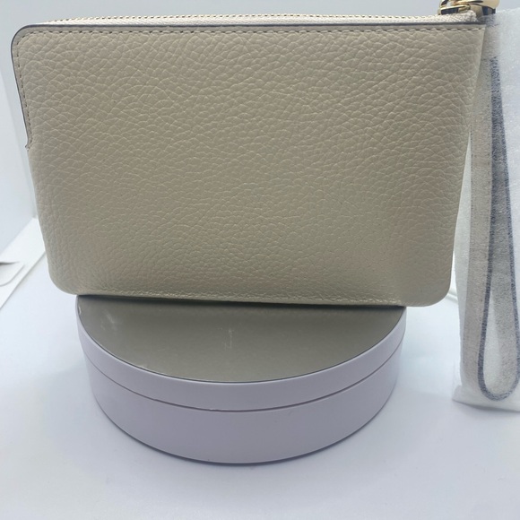 Coach Cream Leather Clutch with Zipper Closure